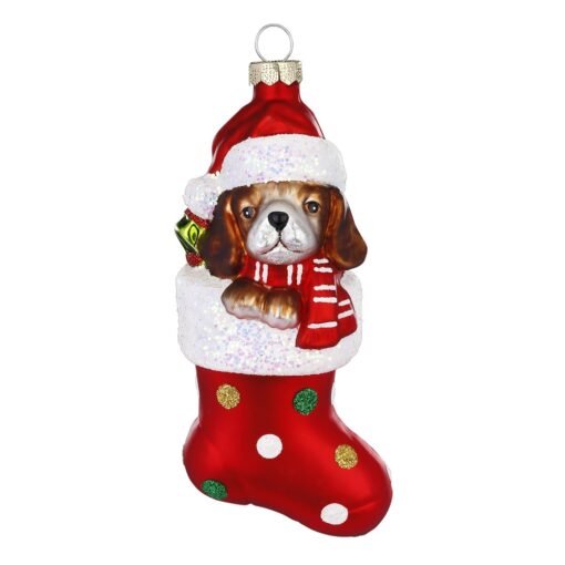 julekule hund i rød strømpe